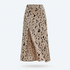 Falda midi animal print beige con manchas negras, caída amplia