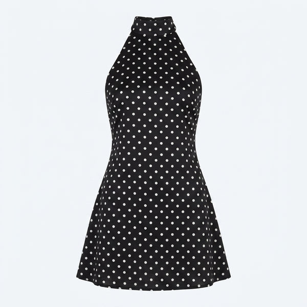 Vestido capri negro con lunares blancos, falda acampanada