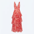 Vestido sin mangas de cuello pico rojo con estampado floral y falda larga con capas de volantes