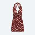 Vestido corto burdeos con lunares amarillos, cuello con lazo y tirantes cruzados