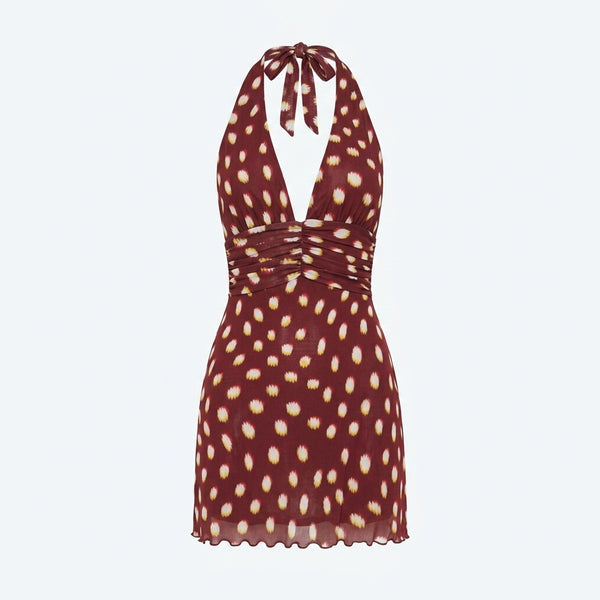Vestido corto burdeos con lunares amarillos, cuello con lazo y tirantes cruzados