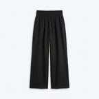 Pantalón fluido negro con cintura elástica y pierna amplia