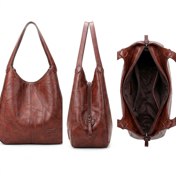 Bolso Orinethe de cuero marrón oscuro, asas y compartimento con cremallera abierta