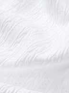 Polo blanco jacquard con relieve geométrico sutil