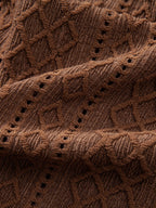 Tela de camisa marrón con rombos jacquard y puntadas decorativas