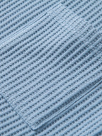 Tejido piqué a rayas de los pantalones cortos de punto celestes