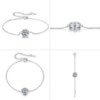 Pulsera de plata con piedra redonda transparente y cierre con cadena extensora.