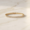 Pulsera de circonitas con eslabones redondos y broche rectangular, dorado