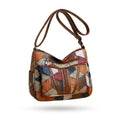 Bolso bandolera patchwork multicolor con asas y detalle de cremallera frontal
