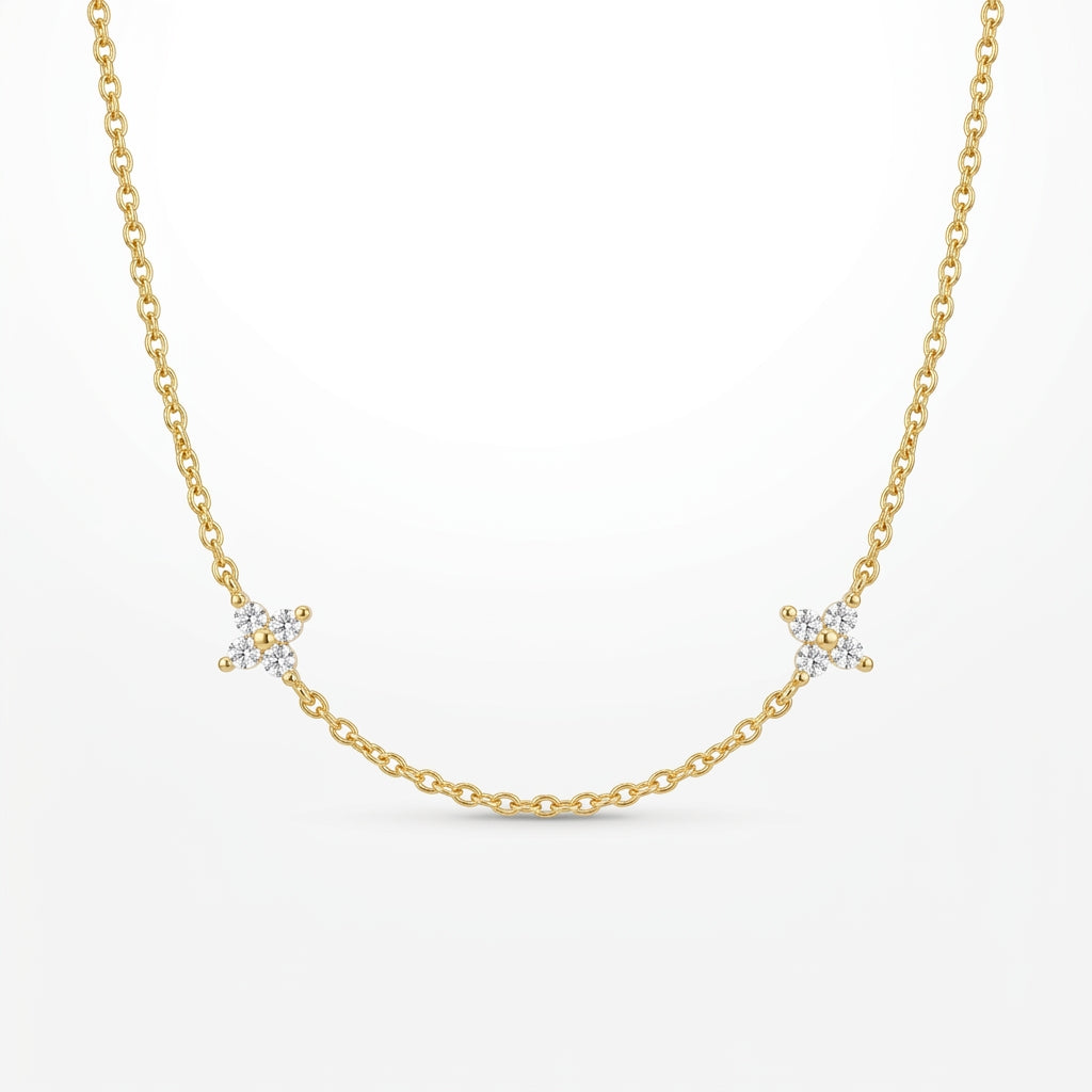 Collar dorado con cadena fina y dos colgantes de circonitas tipo flor
