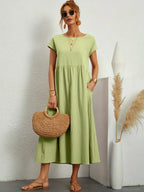 Vestido midi verde menta con manga corta y falda fruncida