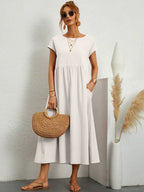 Vestido midi blanco con manga corta y falda fruncida a la cintura