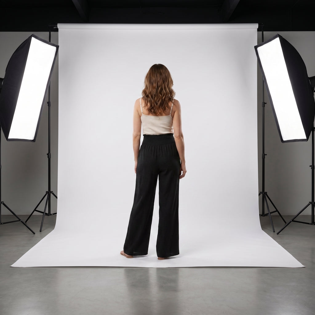Pantalón de lino natural negro con cintura elástica y tiro suelto, pierna ancha