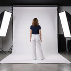 Pantalón relajado de lino y algodón blanco roto, cintura elástica y pernera ancha