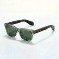 Gafas Vanguard Eclipse con montura verde y lentes verdes oscuras, estilo cuadrado