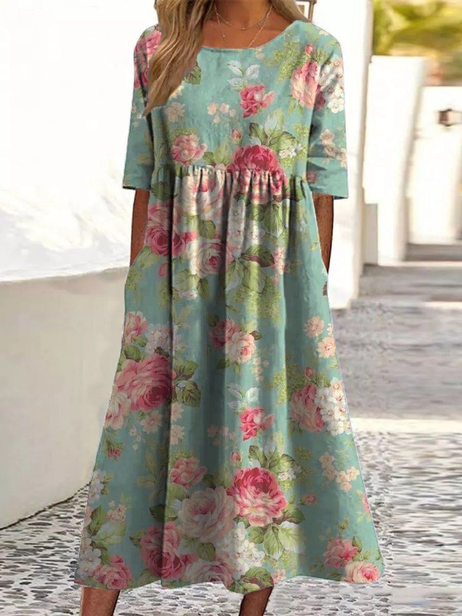 Vestido verde menta con flores rosas, fruncido en cintura y manga corta, falda amplia