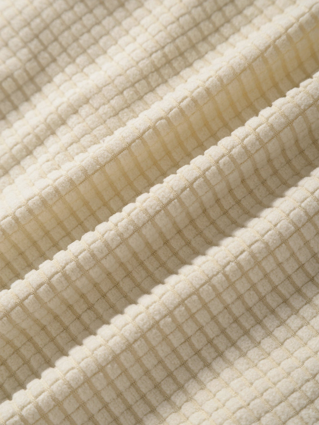 Tela de camisa beige texturizada con relieve cuadriculado