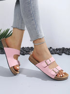 Sandalias Adriana rosa con dos hebillas, cierre ajustable y suela de corcho