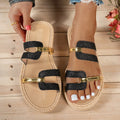 Sandalias Vega con tiras negras y brillo, hebillas doradas y suela de esparto
