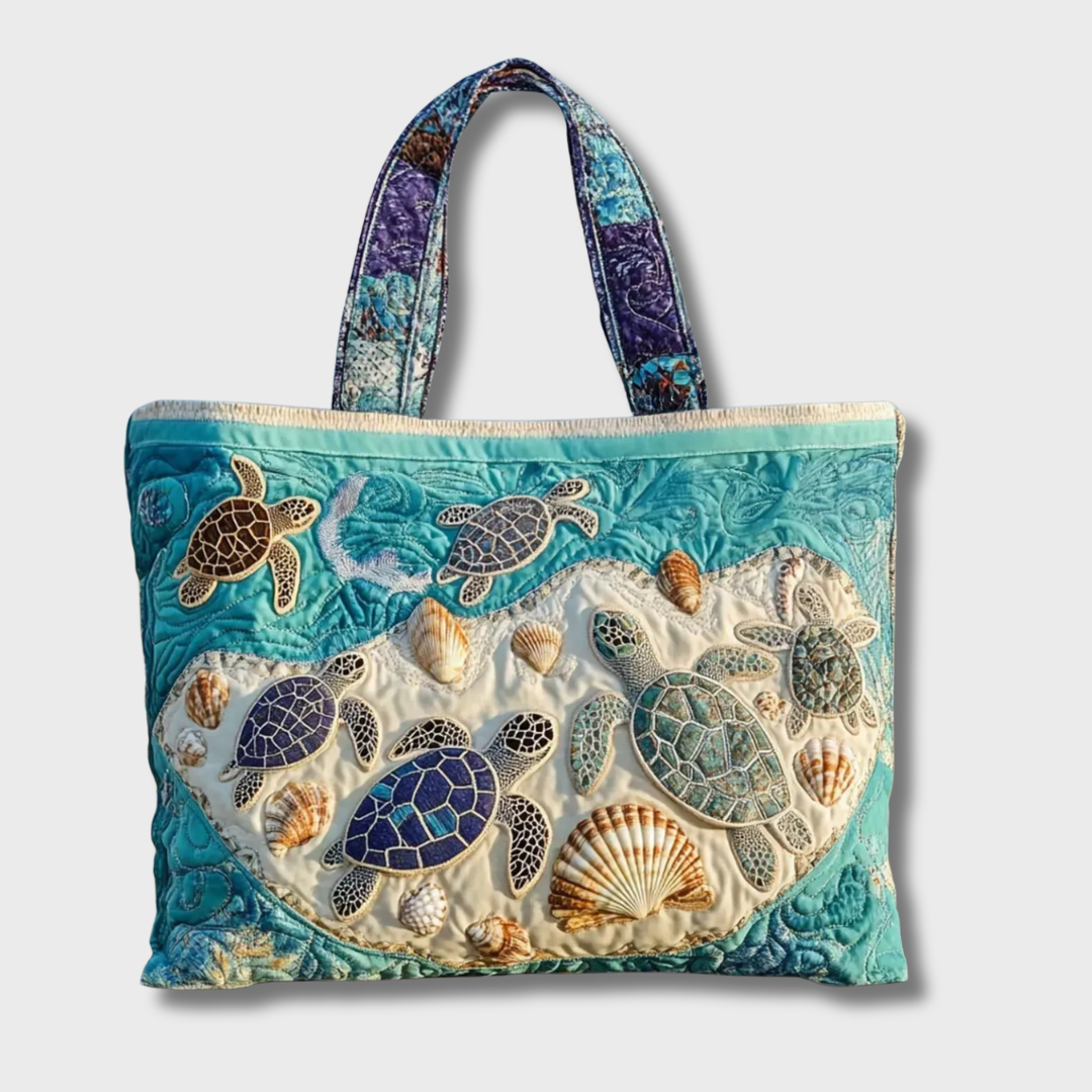 Bolso Kate turquesa con motivo de tortugas marinas y asas de tela