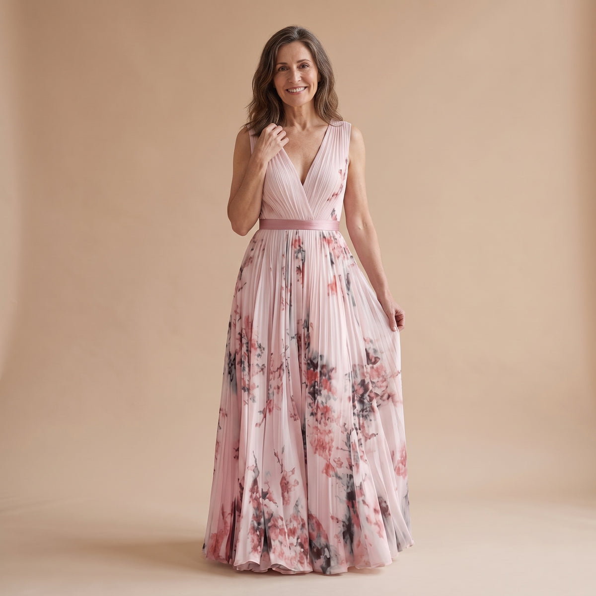 Vestido largo sin mangas rosa claro, escote V cruzado y falda plisada con estampado