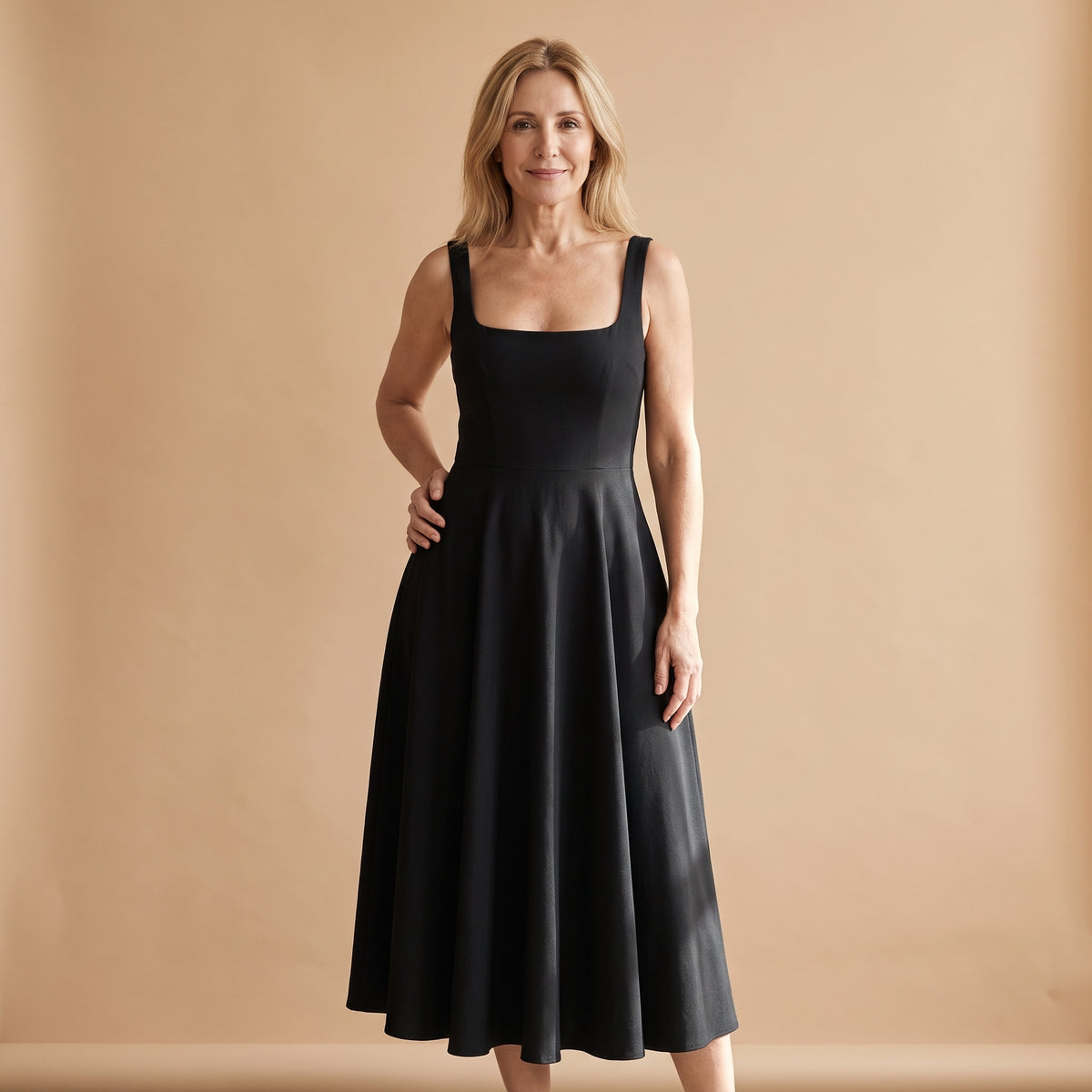 Vestido midi negro con escote cuadrado y falda acampanada