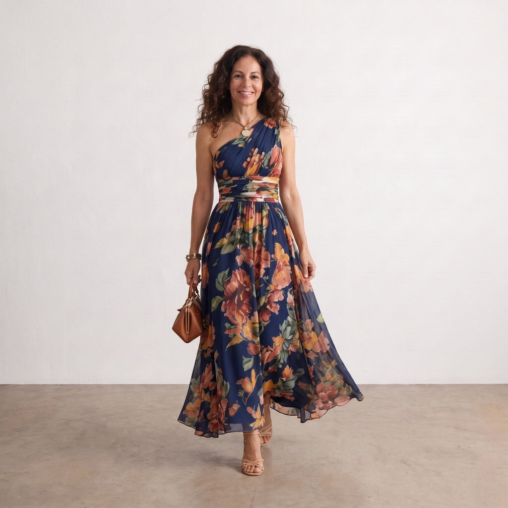 Vestido largo estampado asimétrico con escote lateral, tirante único, base azul.