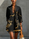 Minivestido negro con estampado de mármol dorado, escote en V y manga 3/4