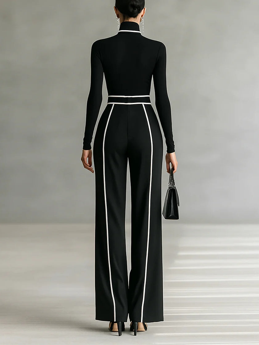 Conjunto negro espalda con cuello alto, cinturón y pantalón ancho con franja blanca