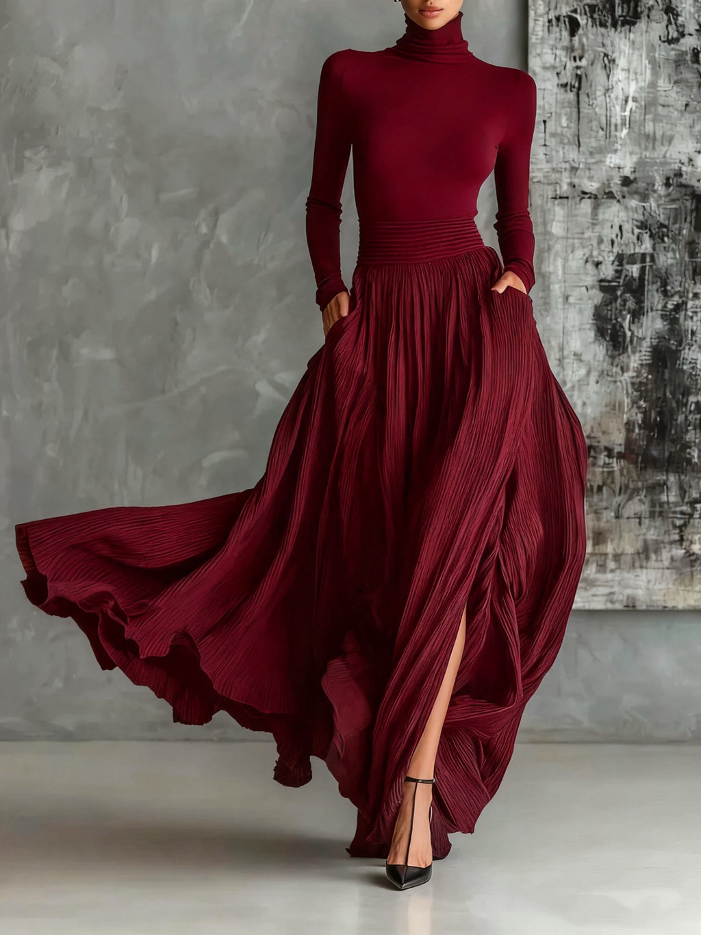 Conjunto con top de manga larga cuello alto rojo oscuro, falda larga plisada con abertura