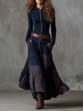 Vestido maxi azul oscuro con botonadura frontal, cinturón ajustable y paneles de cuadros