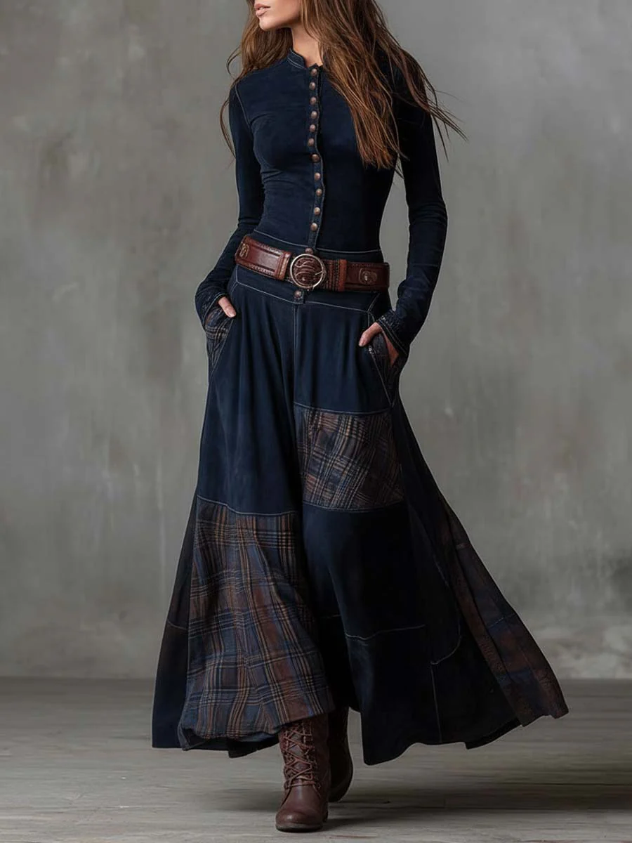 Vestido maxi azul oscuro con cinturón ancho, botonadura y faldón asimétrico con cuadros