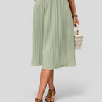 Falda midi plisada verde claro con cintura elástica y falda amplia