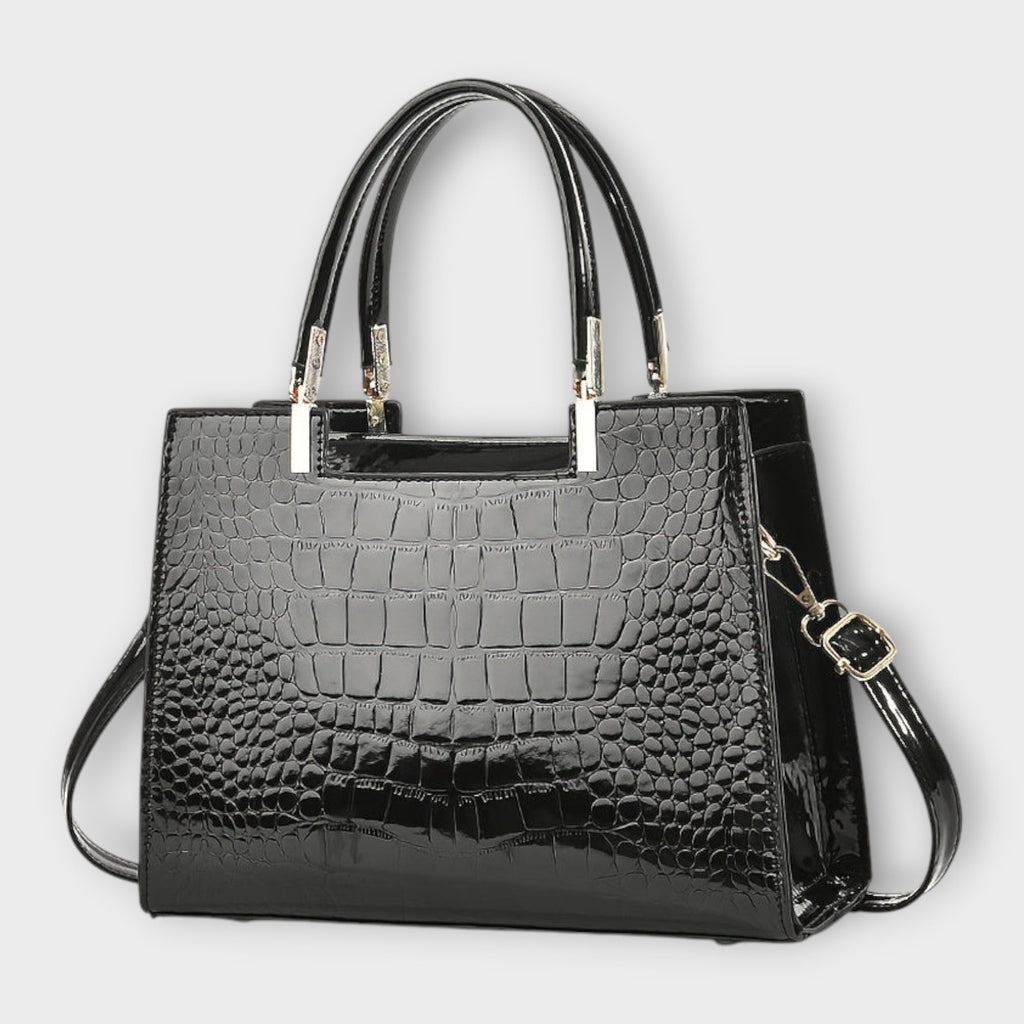 Bolso de piel efecto cocodrilo negro con asa superior y bandolera cruzada
