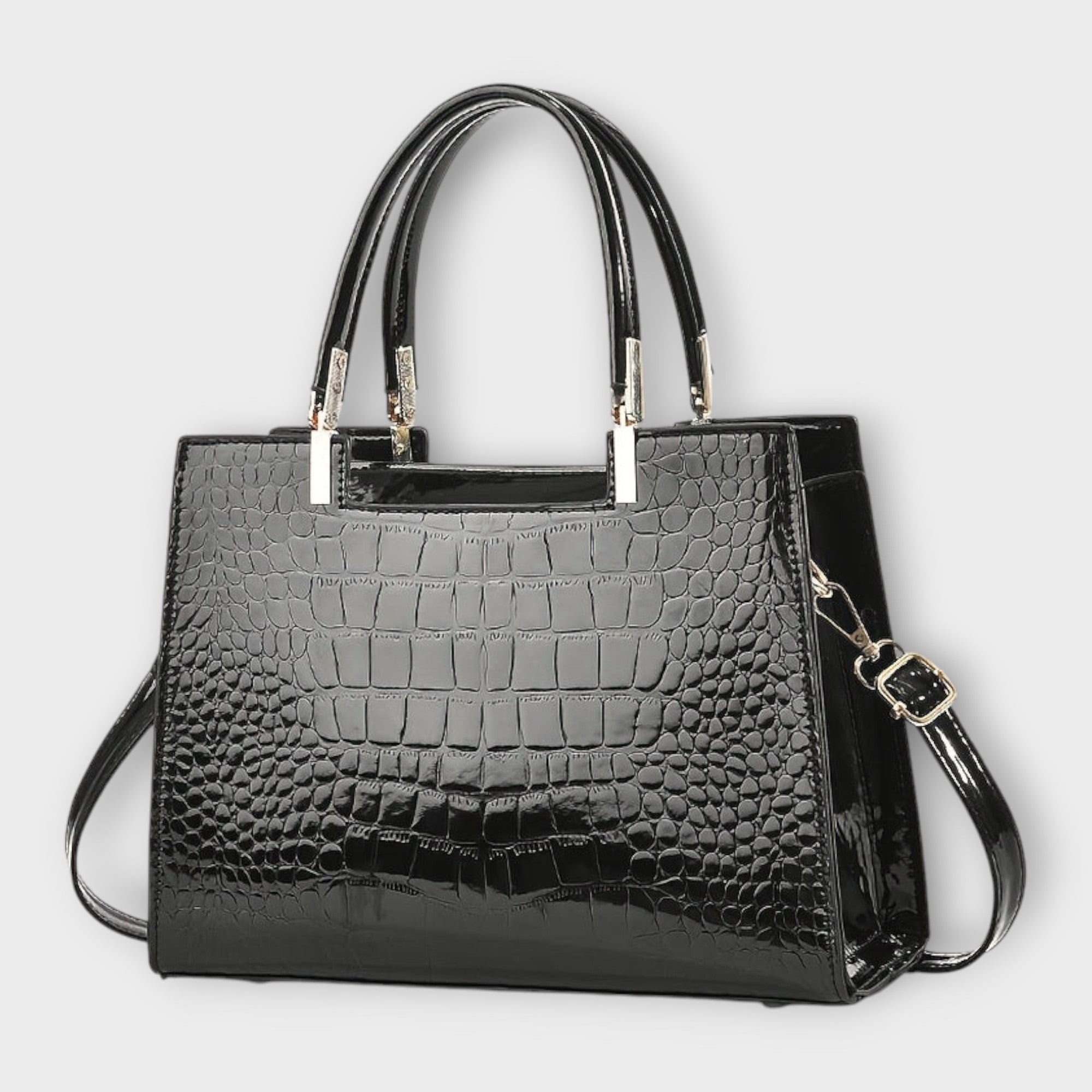 Bolso de piel efecto cocodrilo negro con asa superior y bandolera cruzada