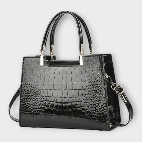 Bolso de piel efecto cocodrilo negro con asa superior y bandolera cruzada