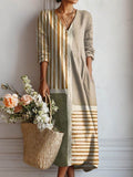 Vestido largo bohemio de tela beige con rayas doradas y escote en V