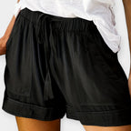 Shorts con cinturón ajustable negro con cordón, pretina elástica y bolsillos delanteros