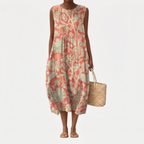 Vestido midi sin mangas estampado floral, corte evasé y bolsillos laterales