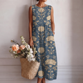 Vestido midi sin mangas azul con estampado floral dorado y cuello redondo