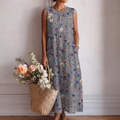 Vestido midi sin mangas azul gris con estampado floral y fruncido en la cintura