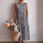 Vestido midi sin mangas azul gris con estampado floral y fruncido en la cintura