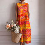 Vestido midi sin mangas con cuello redondo y estampado naranja y rosa