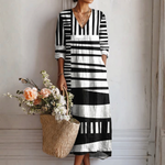 Vestido midi estampado gráfico en blanco y negro, escote V y mangas 3/4