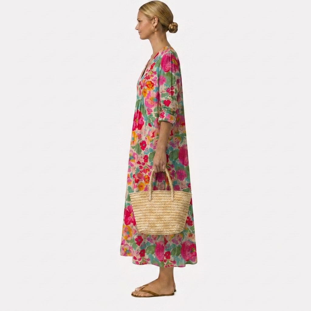 Vestido midi floral multicolor con escote en V y caída suelta, mangas 3/4