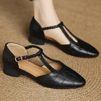 Zapatos de tacón bajo negros con tira trenzada y hebilla metálica, estilo bailarina