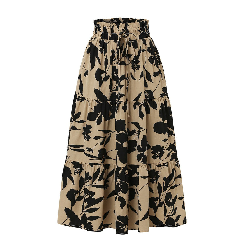 Falda midi acampanada beige con estampado floral negro y cintura elástica fruncida