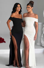 Vestidos largos negro y blanco con escote off-shoulder y abertura frontal