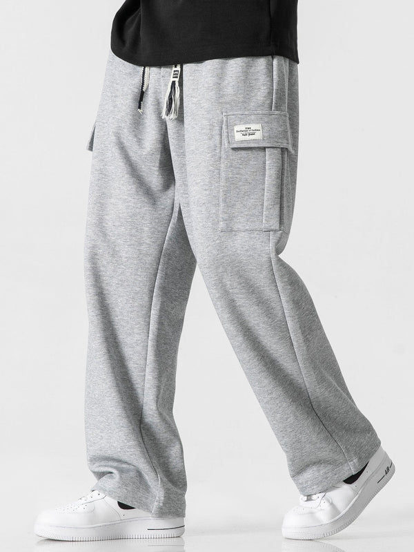 Pantalón cargo gris jaspeado con bolsillos laterales y trabillas en la cintura