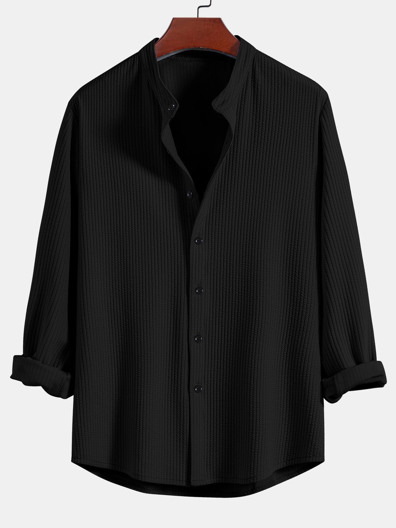 Camisa acanalada negra de manga larga, cuello de pie y botones